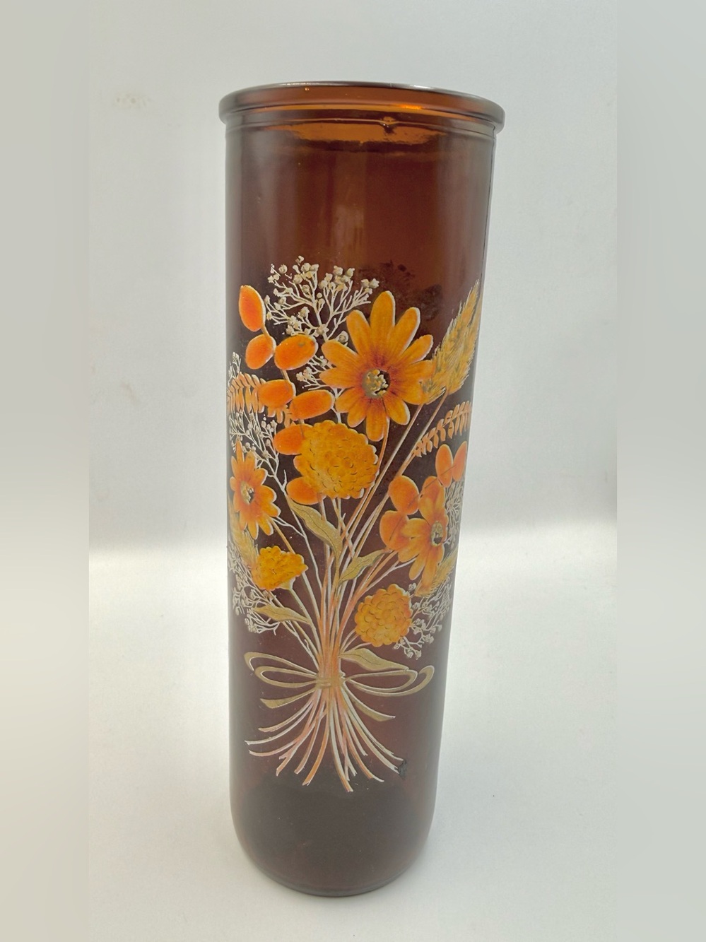 Vintage Amber Glass Vase Featuring A Retro Orange And Yellow Floral Bouquet